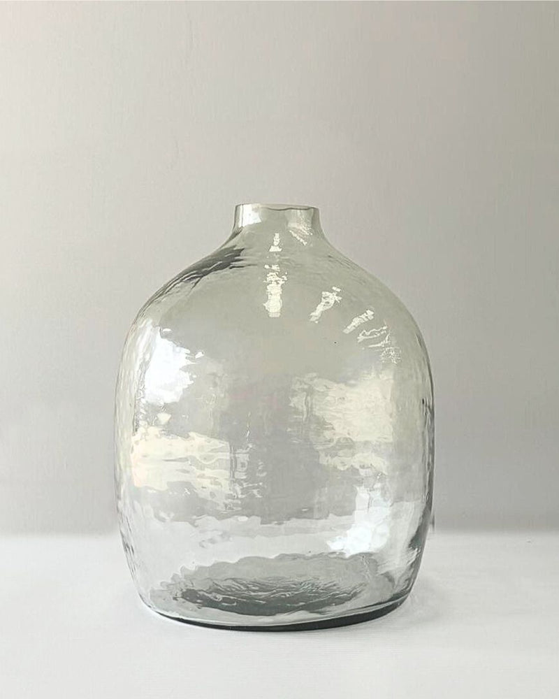 Clear glass vase on a white background