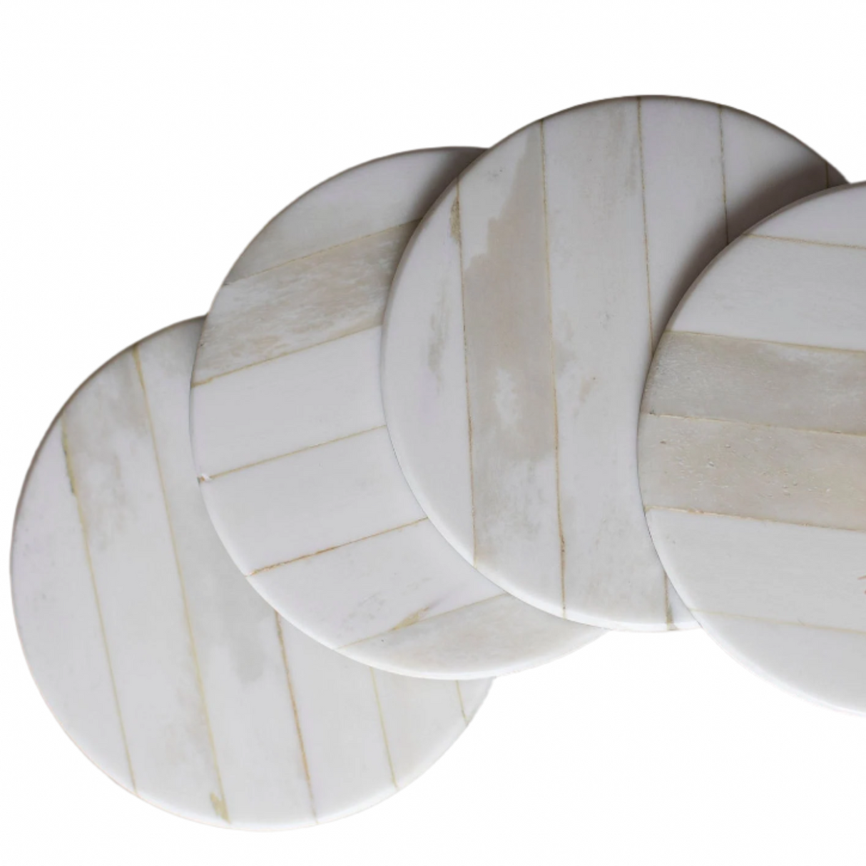 Set of four marble-patterned coasters on a white background