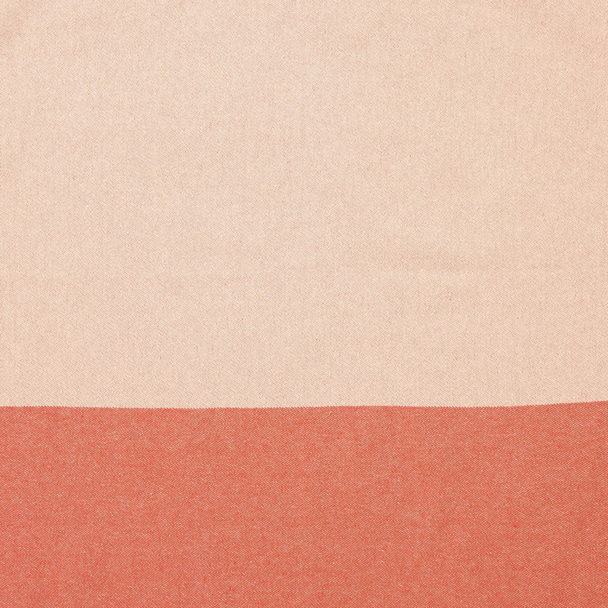 Beige and terracotta color-blocked fabric on a white background