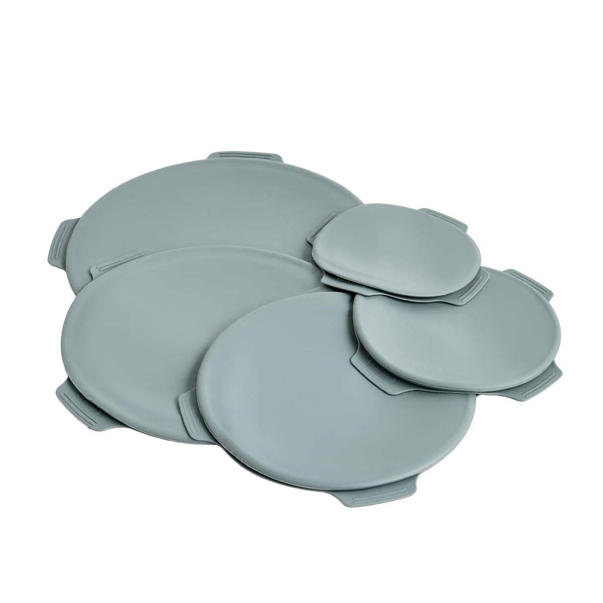 Set of gray silicone lids on a white background