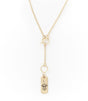 Gold necklace with a tag pendant on a white background