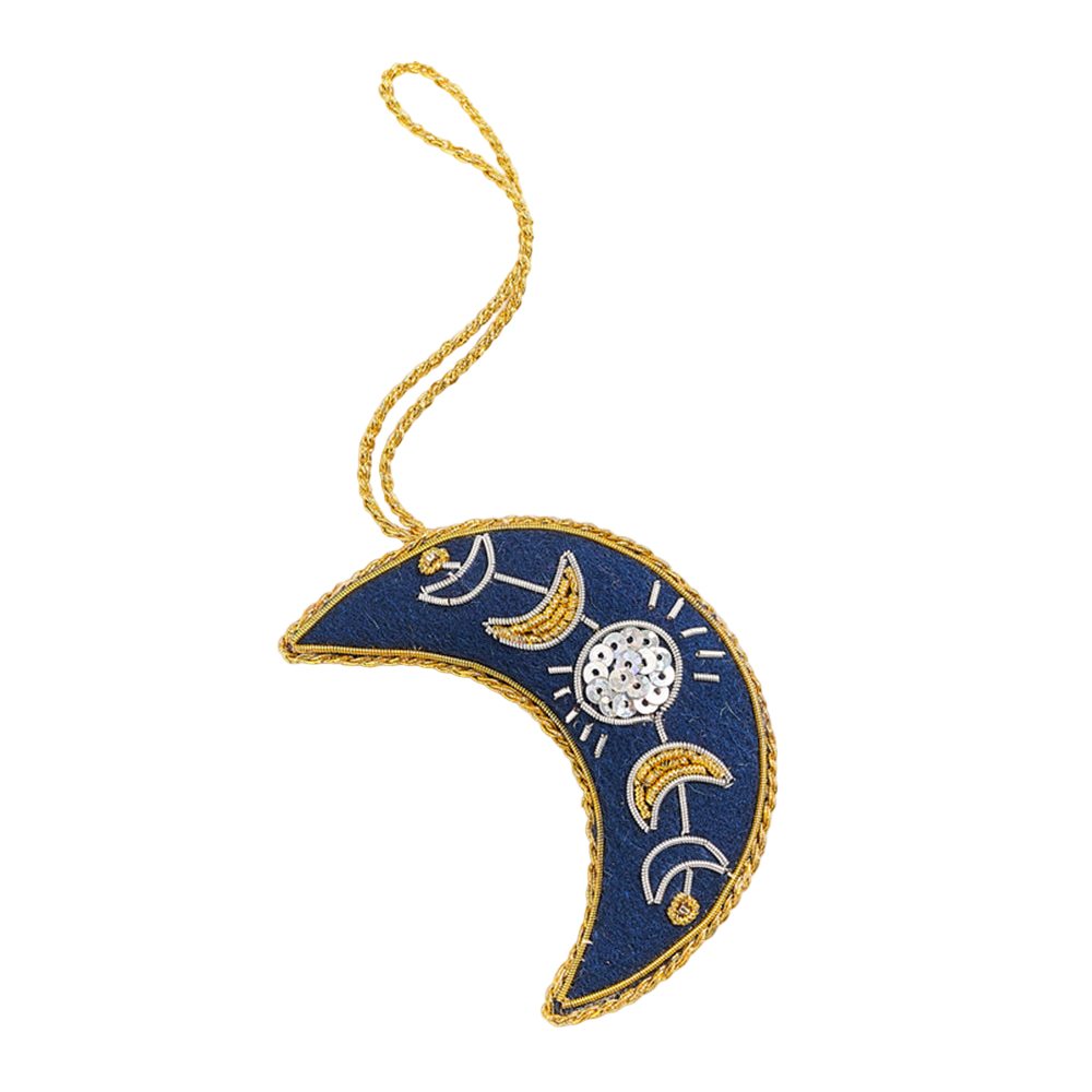 Decorative moon-shaped ornament with gold and silver details on a white background