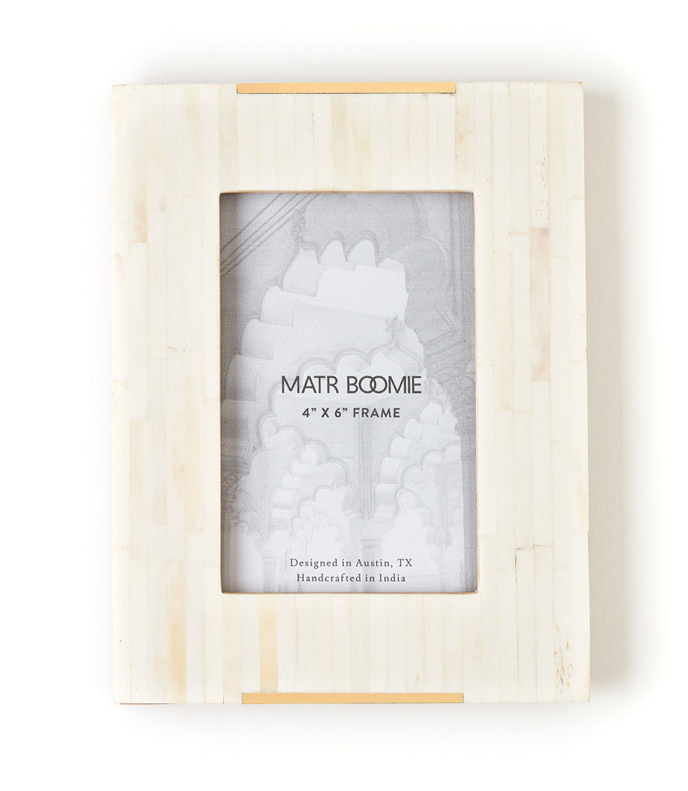 Wooden photo frame with 'MATR BOOMIE' branding on a white background