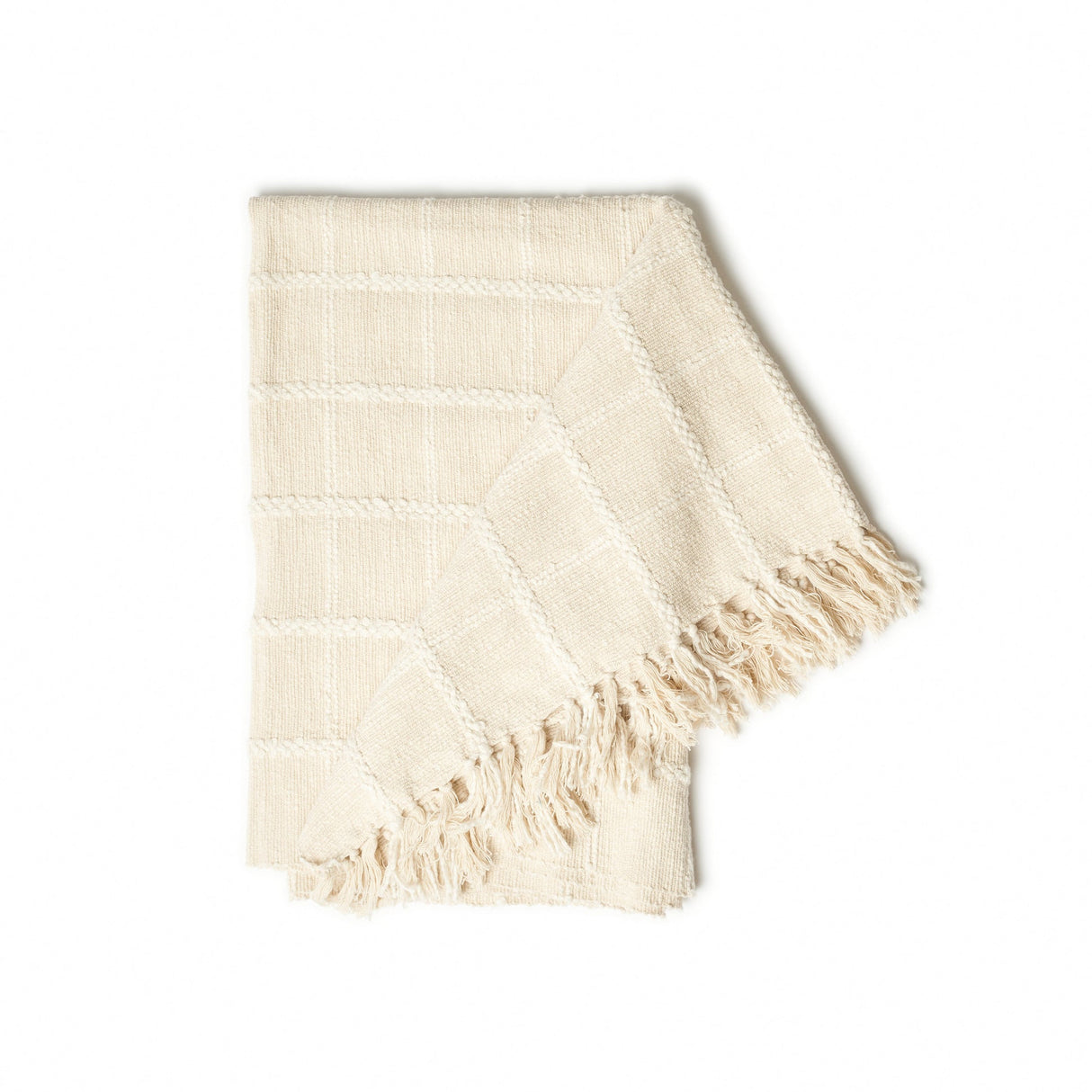 Beige woven blanket with frayed edges on a white background