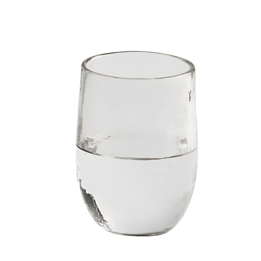 Clear glass tumbler on a white background
