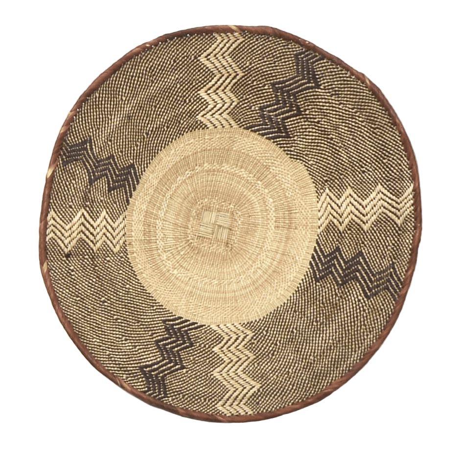 Woven basket with zigzag pattern on a white background