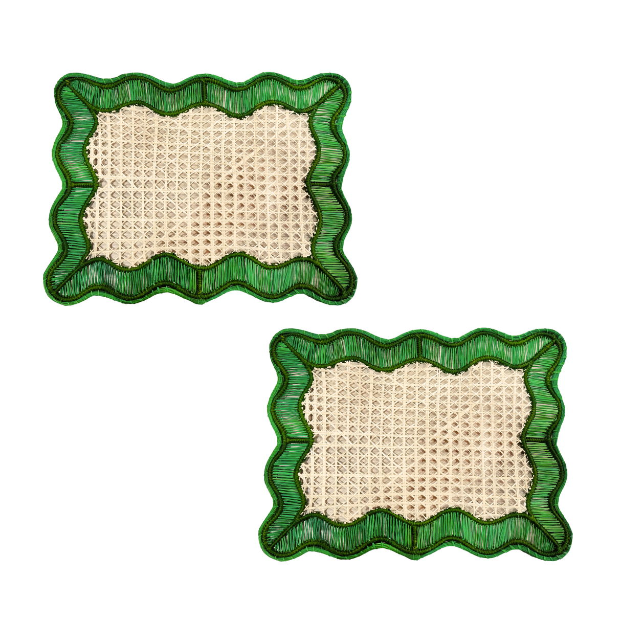 Two square placemats with green wicker frames on a white background