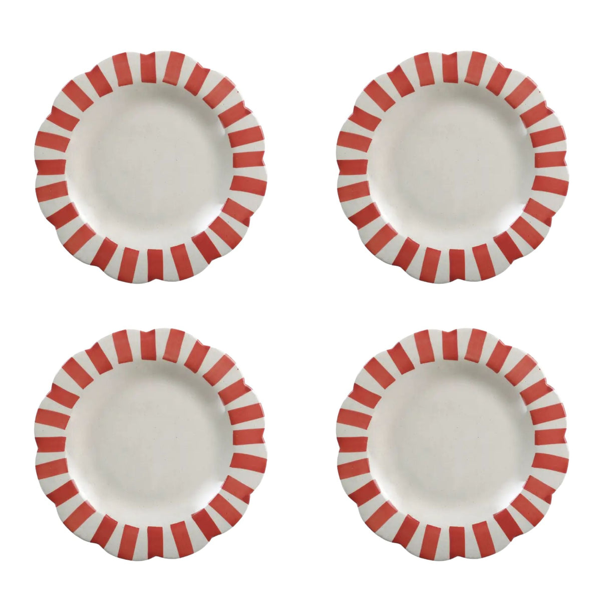 Four ceramic plates with red and white striped rims on a white background