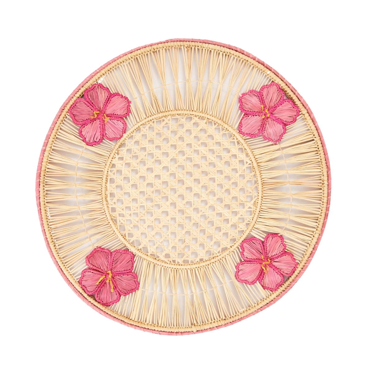 Round woven plate with pink floral designs on a white background