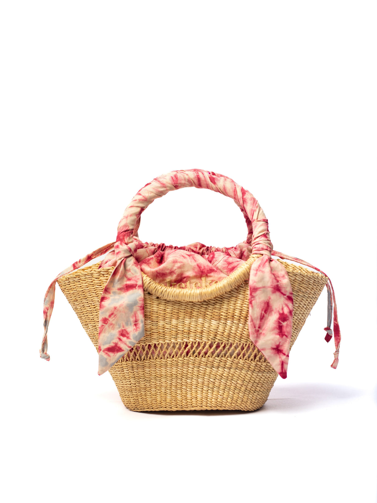 Woven basket with pink floral fabric on a white background