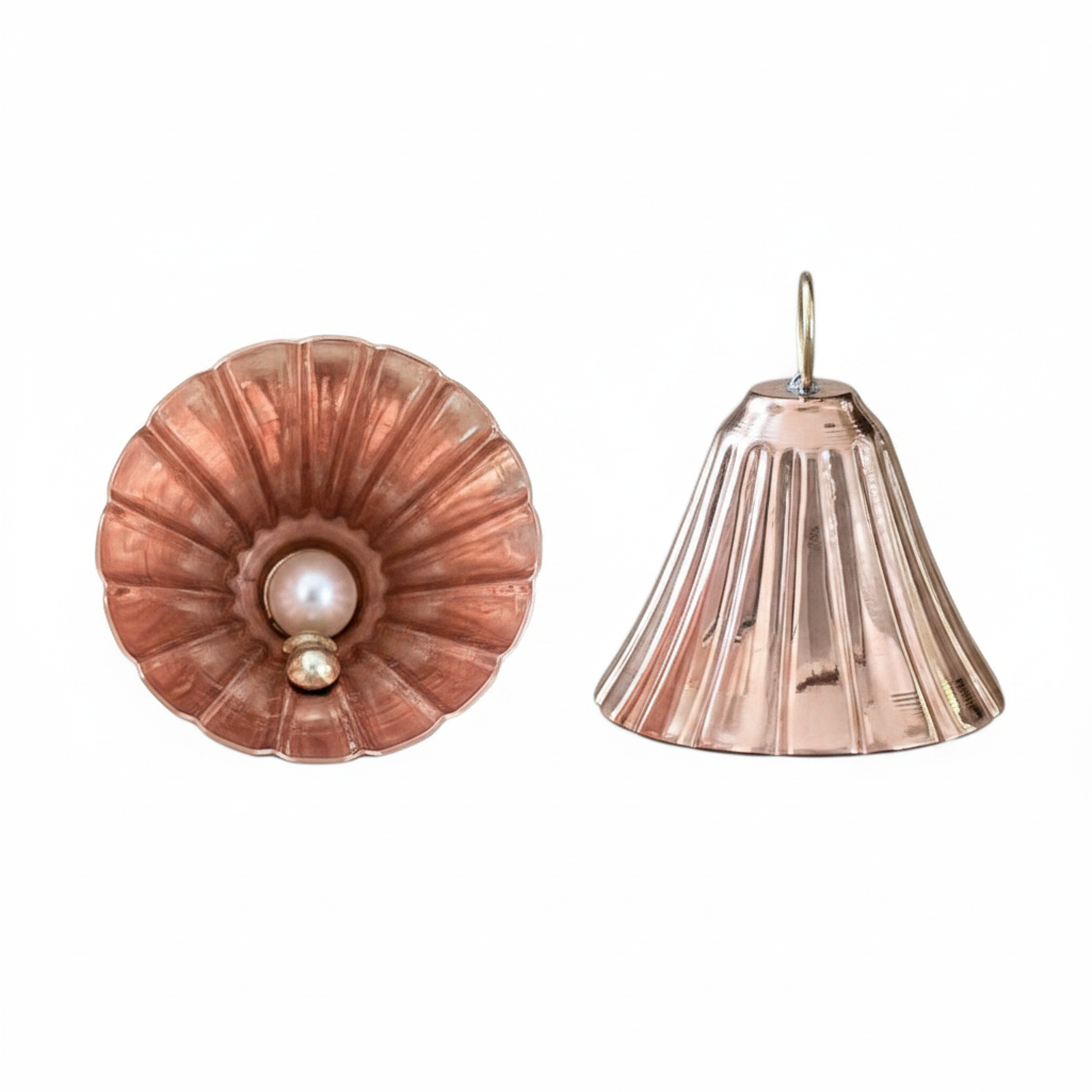 Rose gold shell-shaped earrings on a white background