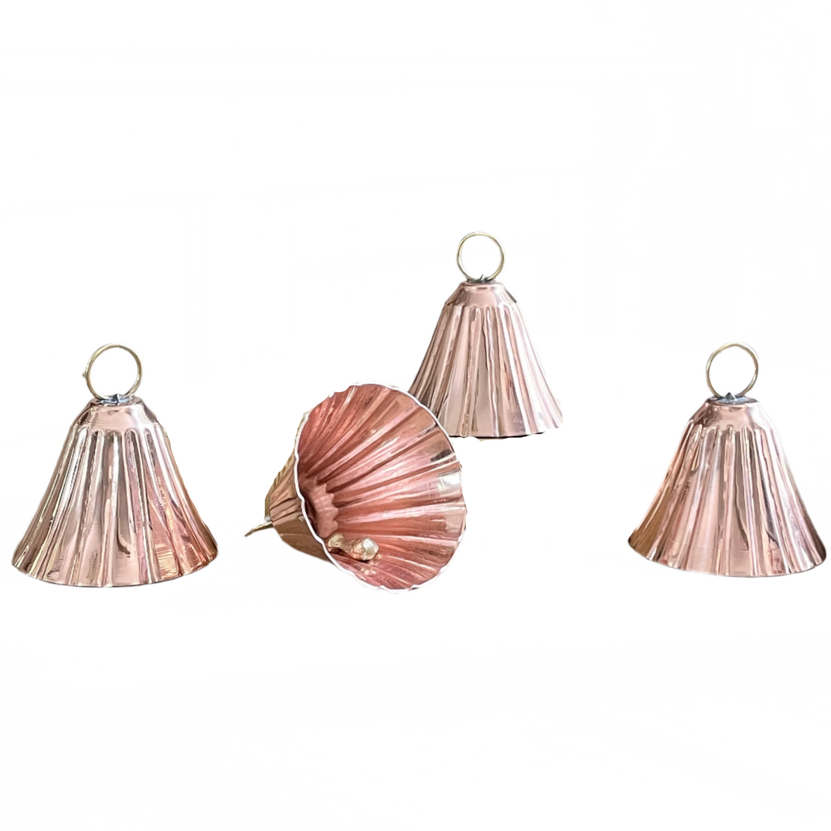 Set of rose gold shell-shaped ornaments with a decorative box on a white background