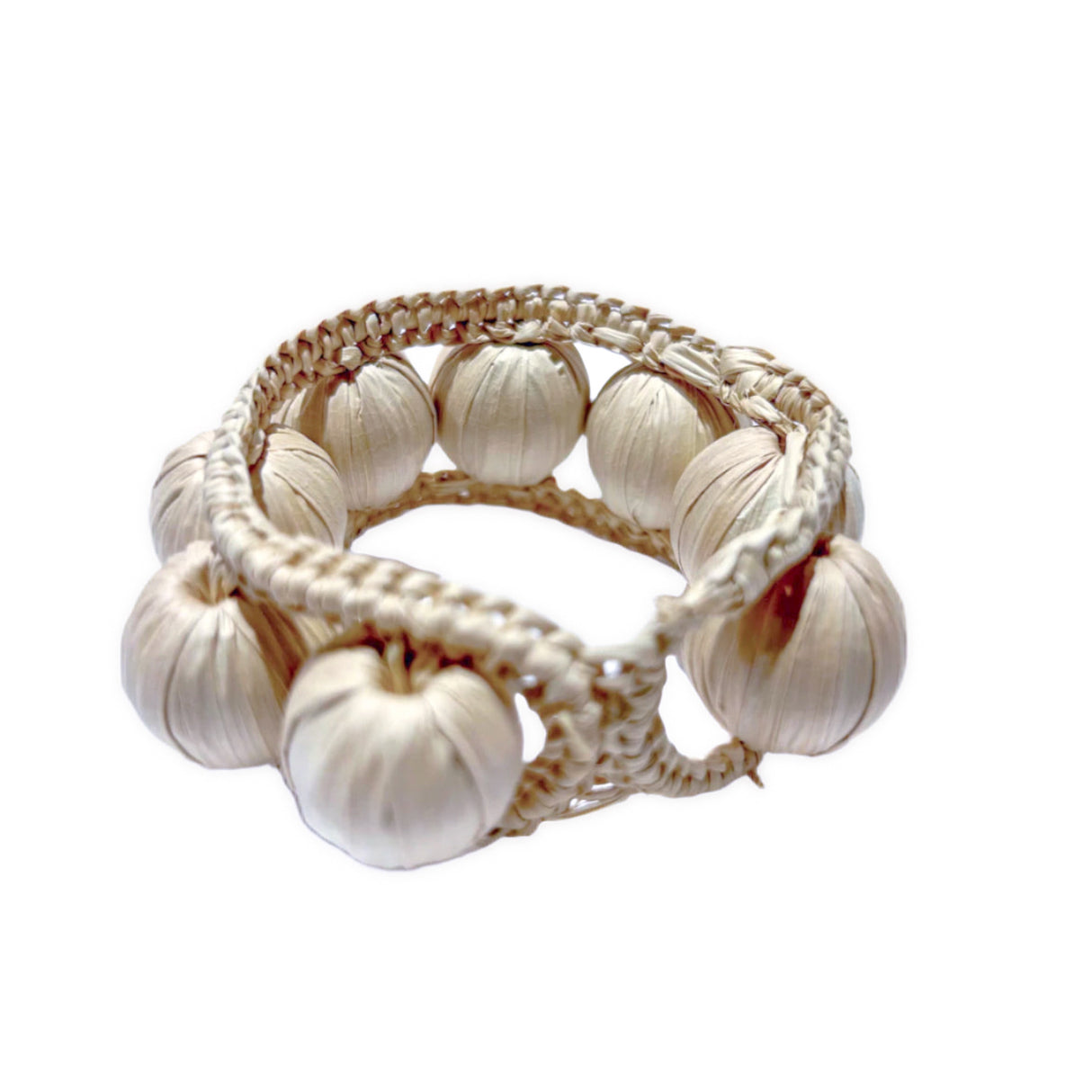 napkin ring made of woven beads on a white background