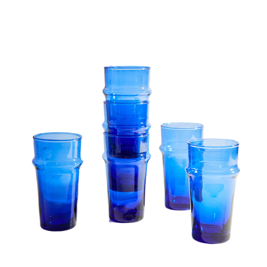 Set of blue plastic cups on a white background