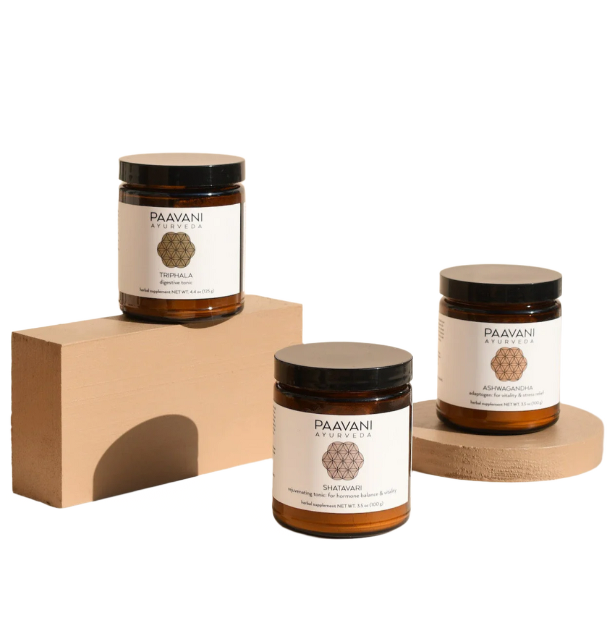Three jars of Paavani Ayurveda products on a white background