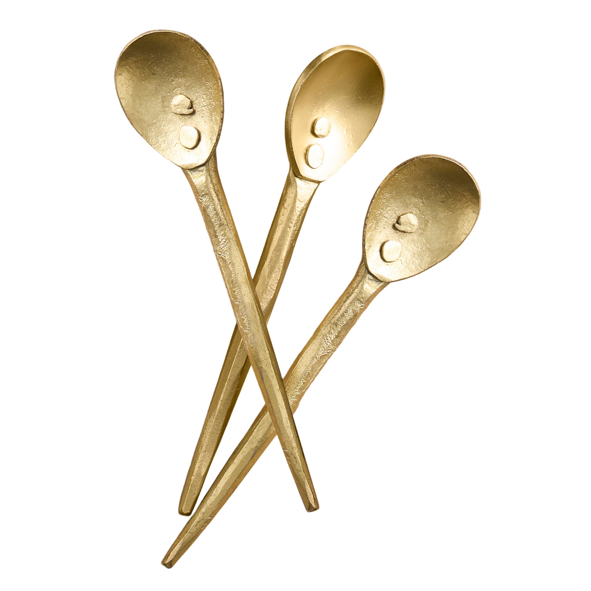 Three gold spoons arranged in a crossed position on a white background