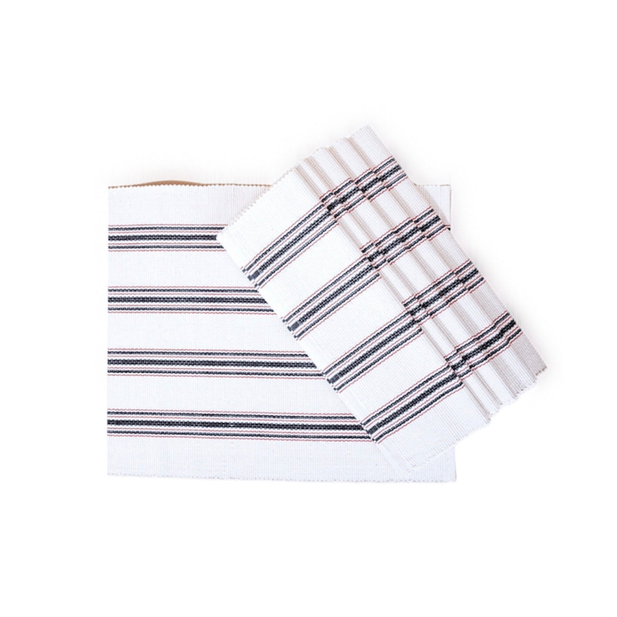 White placemats with black stripes on a white background