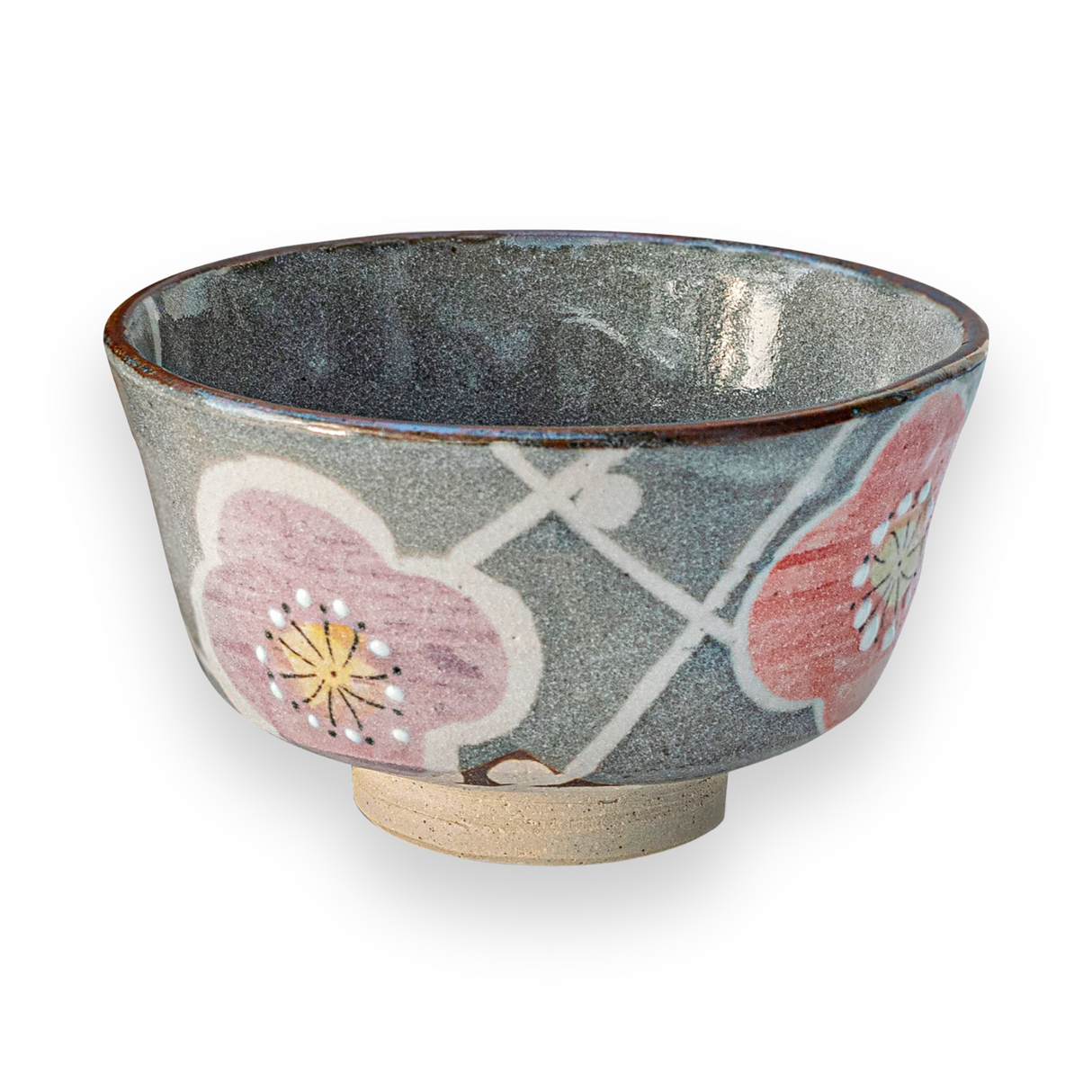 The Gray with Flowers Ceramic Matcha Bowl features a pink and red floral design on a gray background, set against black, ideal for enriching your tea accessories collection.