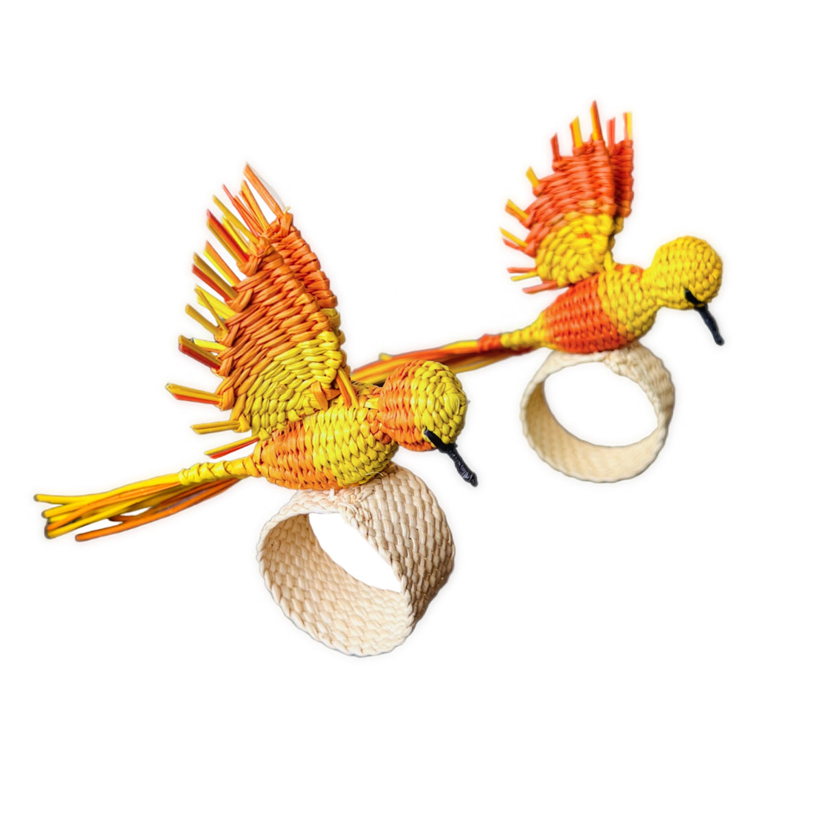 Two colorful bird-shaped napkin rings with orange and yellow feathers on a white background