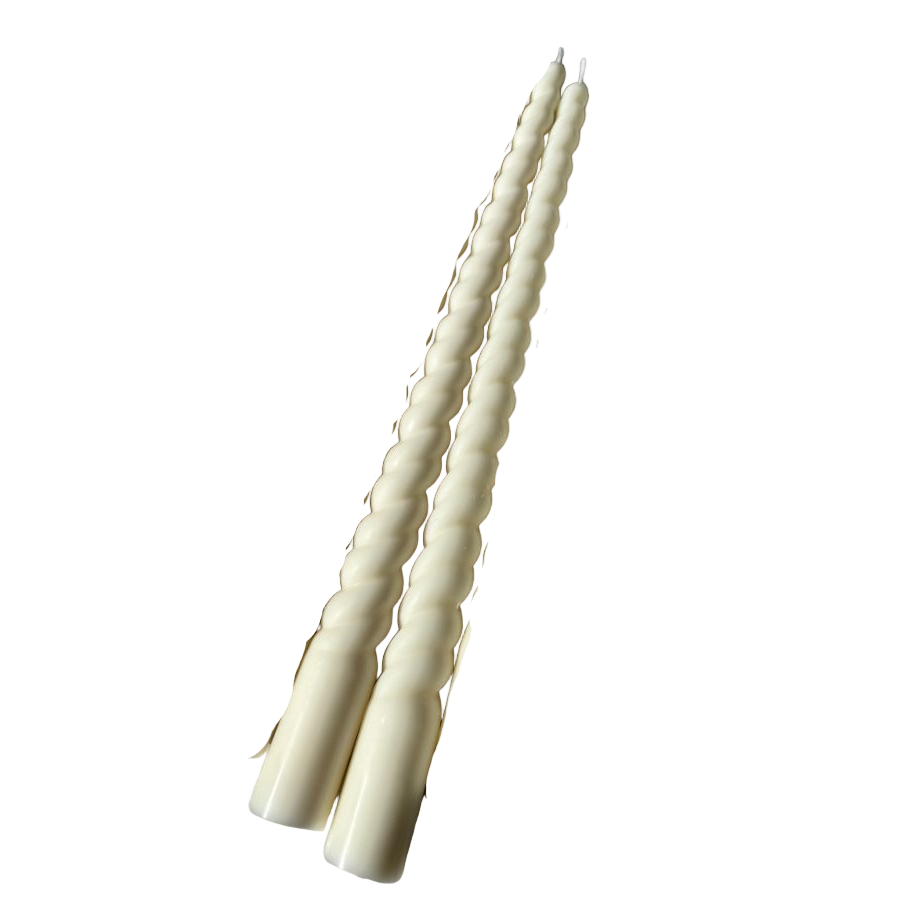 Set of white twisted candles on a white background