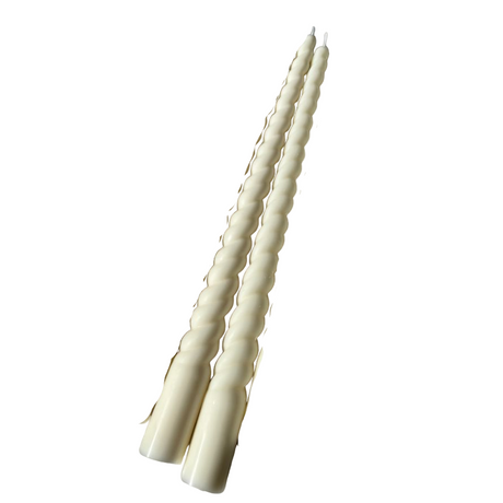 Set of white twisted candles on a white background