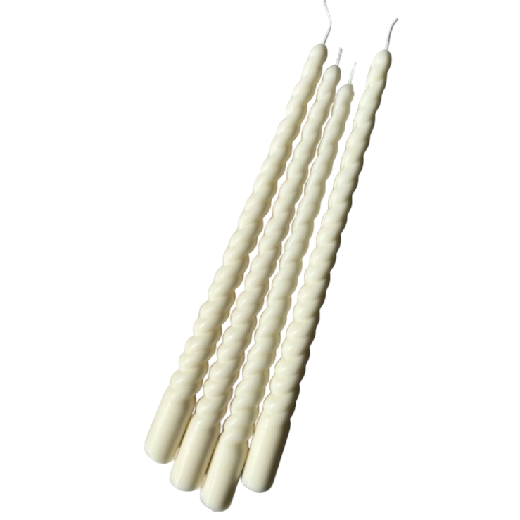 Set of white twisted candles on a white background