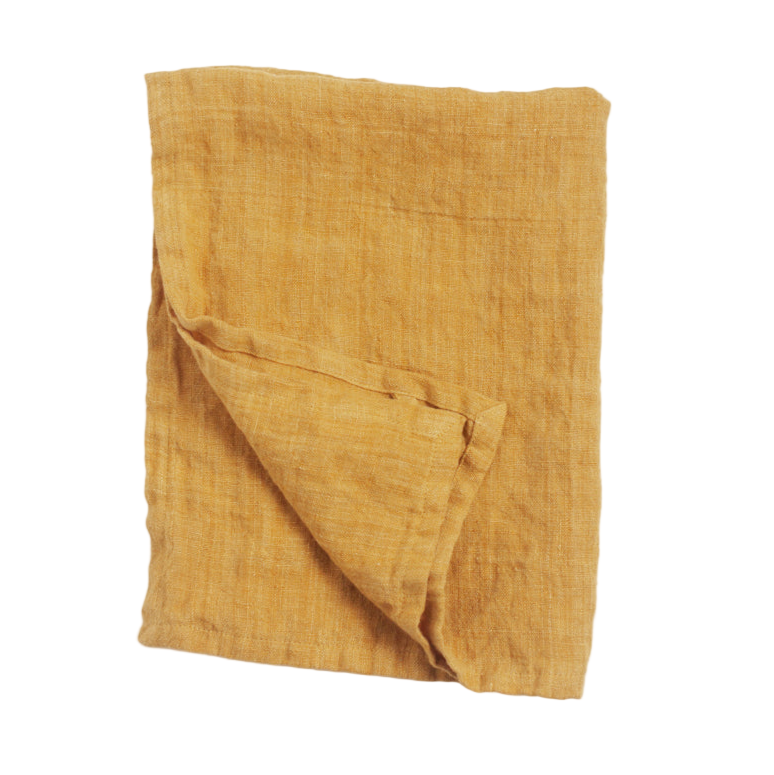 Mustard yellow fabric square on a white background