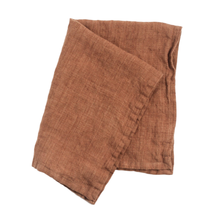 Brown tea towel on a white background