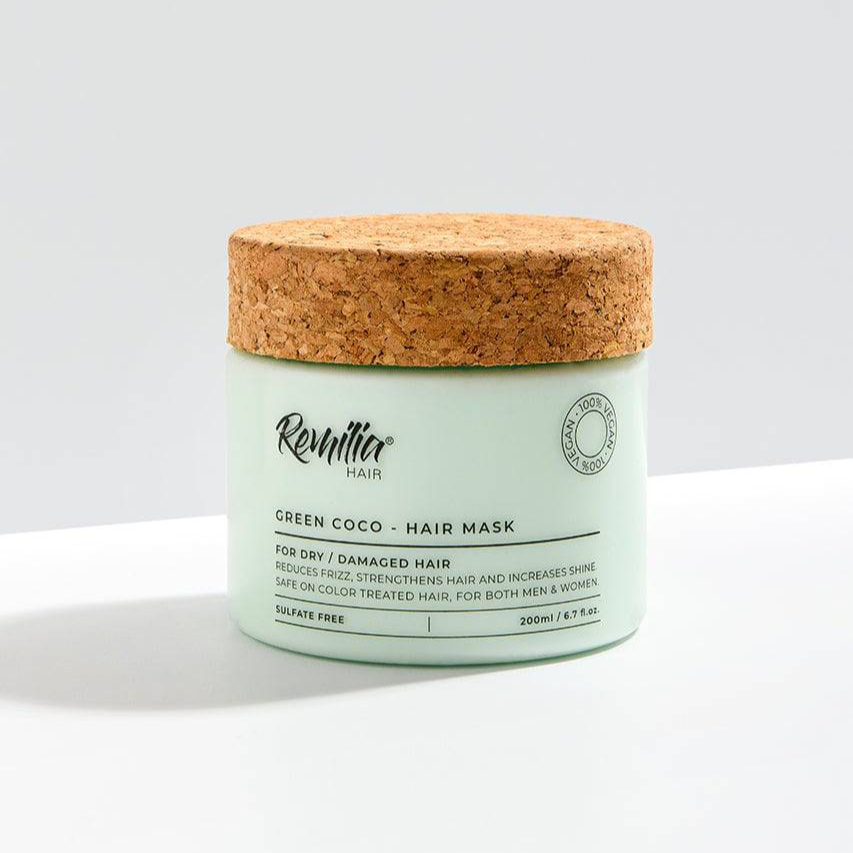 Remilia Green Coco hair mask jar with cork lid on a white background