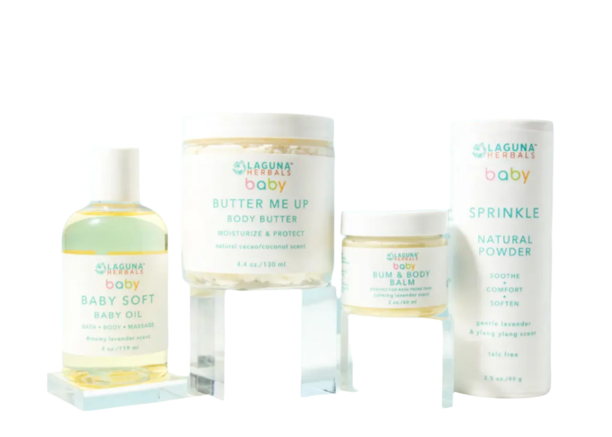 Collection of Laguna Blue Baby skincare products on a white background