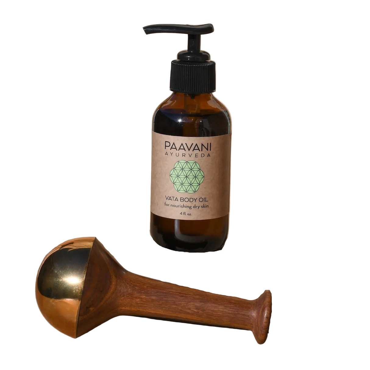 Brown bottle with pump and wooden Kansa facial wand on a white background