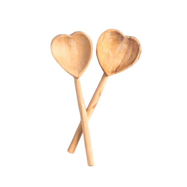 Two heart shaped wooden coffee spoons on a white background