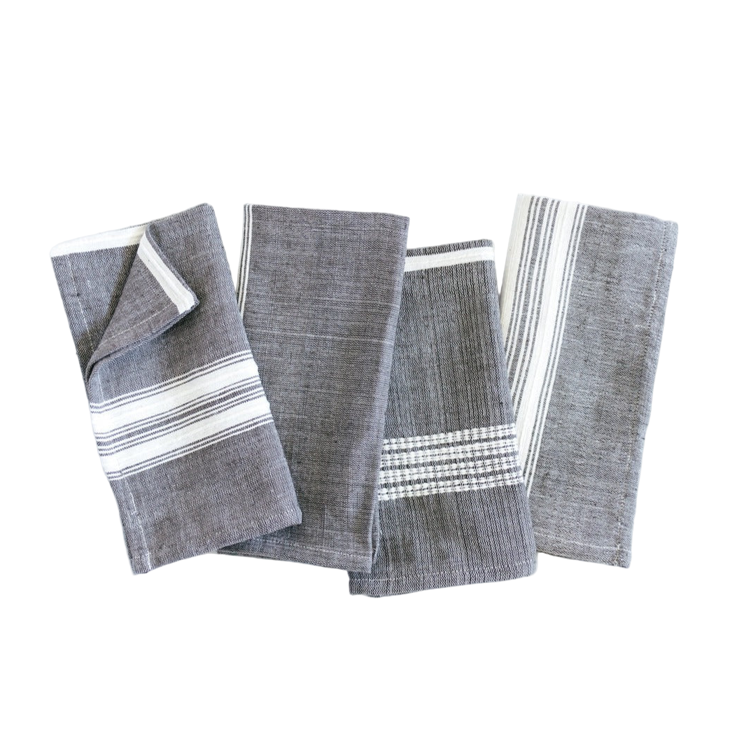 Set of gray and white striped napkins on a white background