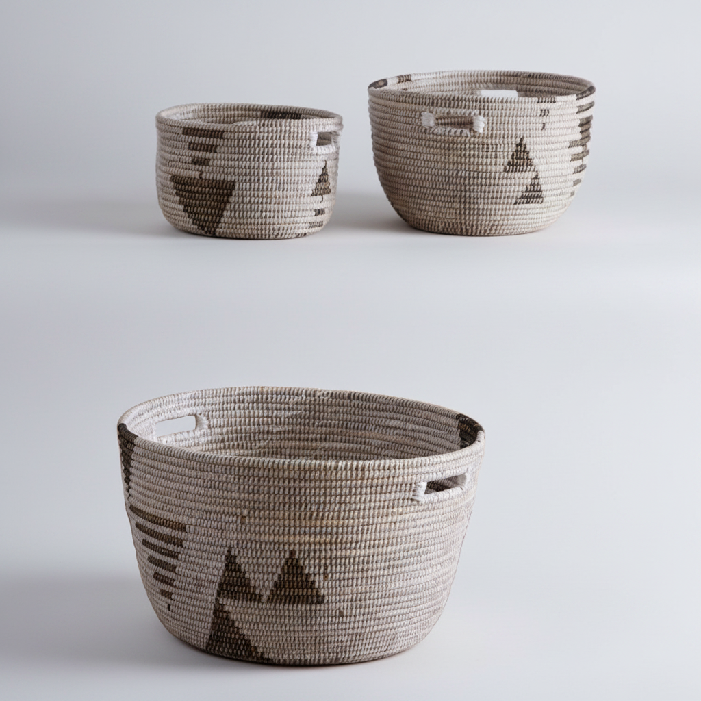 Three woven baskets with star patterns on a white background