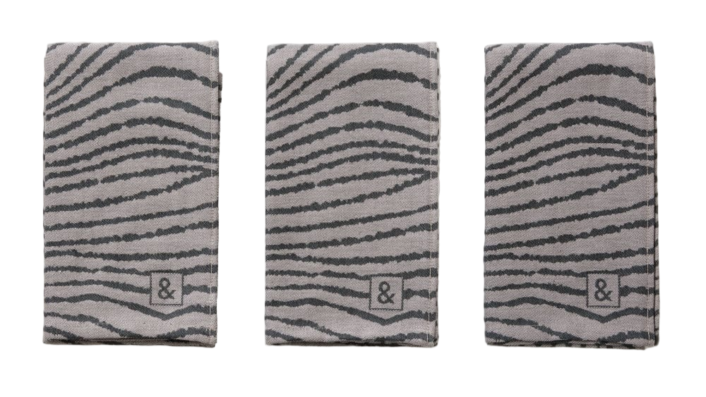 Three gray towels with zebra stripe pattern and brand logo on a white background