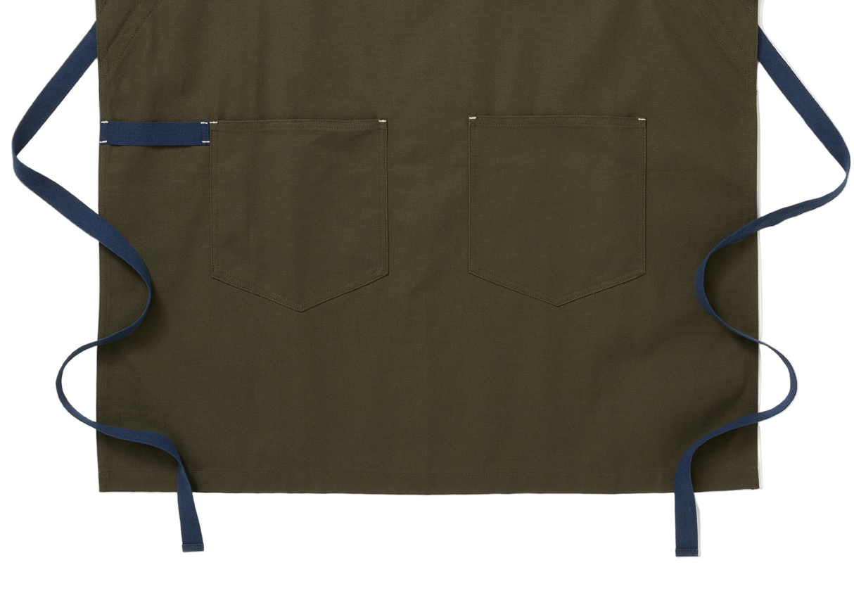 Brown apron with blue straps on a white background
