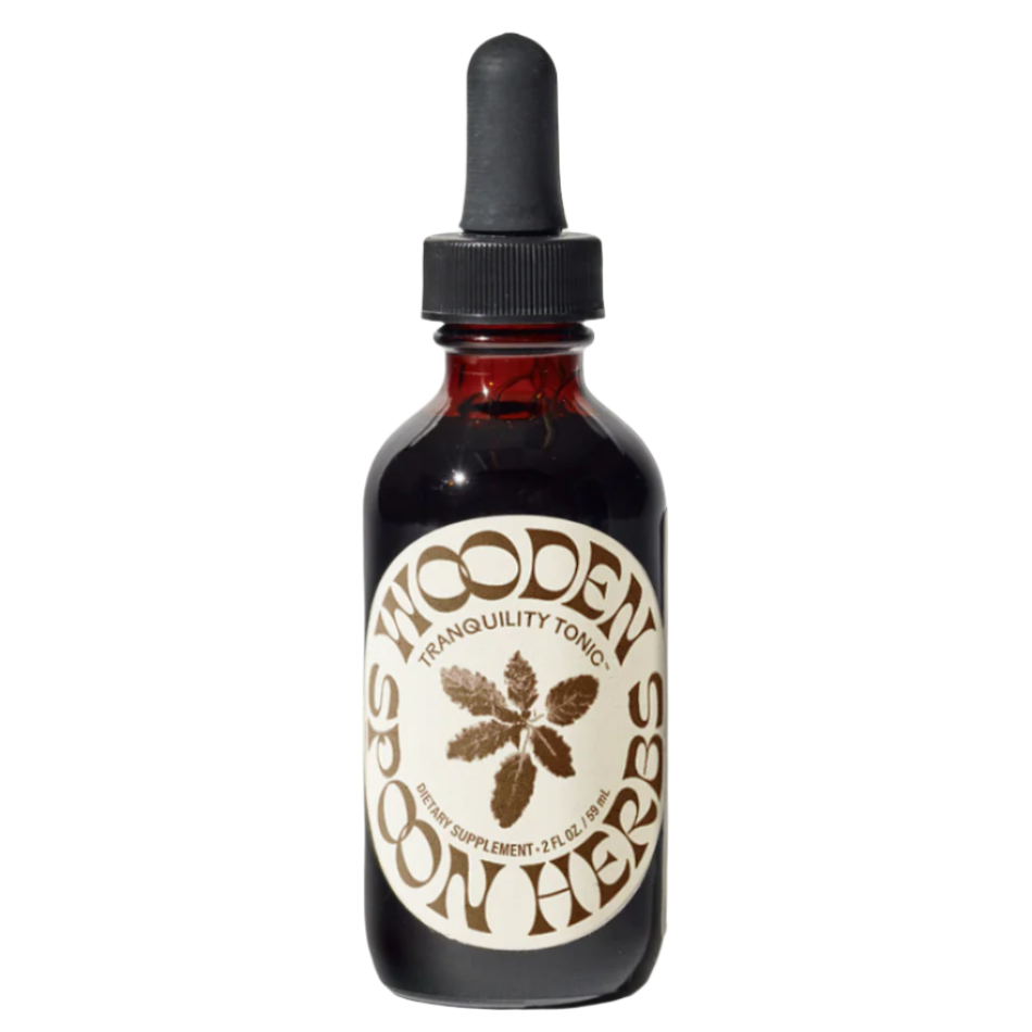 Bottle of 'Wooden Spoon Herbs' tranquility tonic on a white background