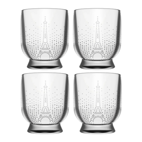 A 2x2 grid of four La Rochere Parisienne Tumblers, clear with dotted patterns, evokes French elegance on a white background. Perfect for enjoying fine spirits, these tumblers bring sophistication to any setting.