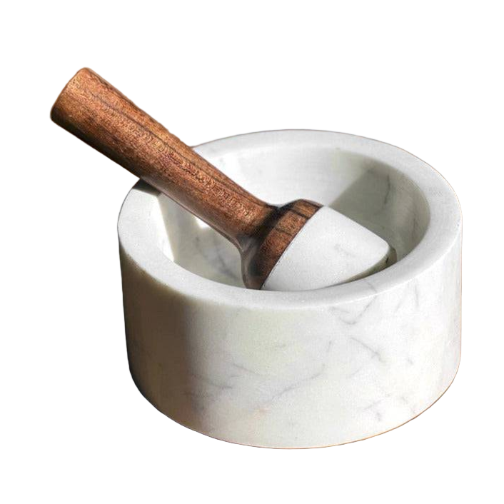 Marble mortar and pestle set on a white background