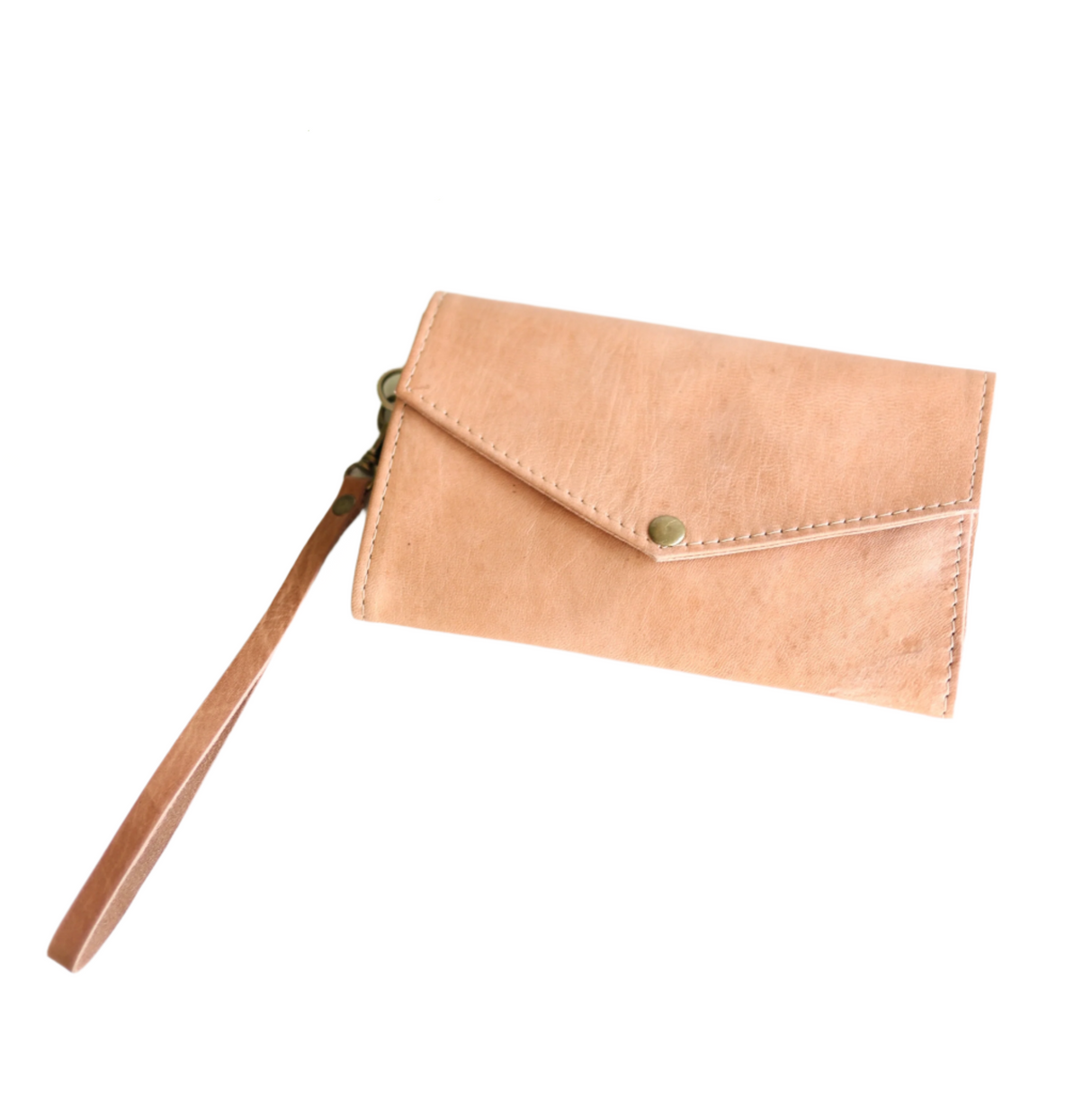 Tan leather wallet with wrist strap on a white surface
