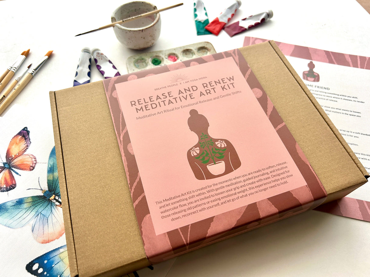 Meditative art kit packaging with tools and butterfly decorations on a white surface