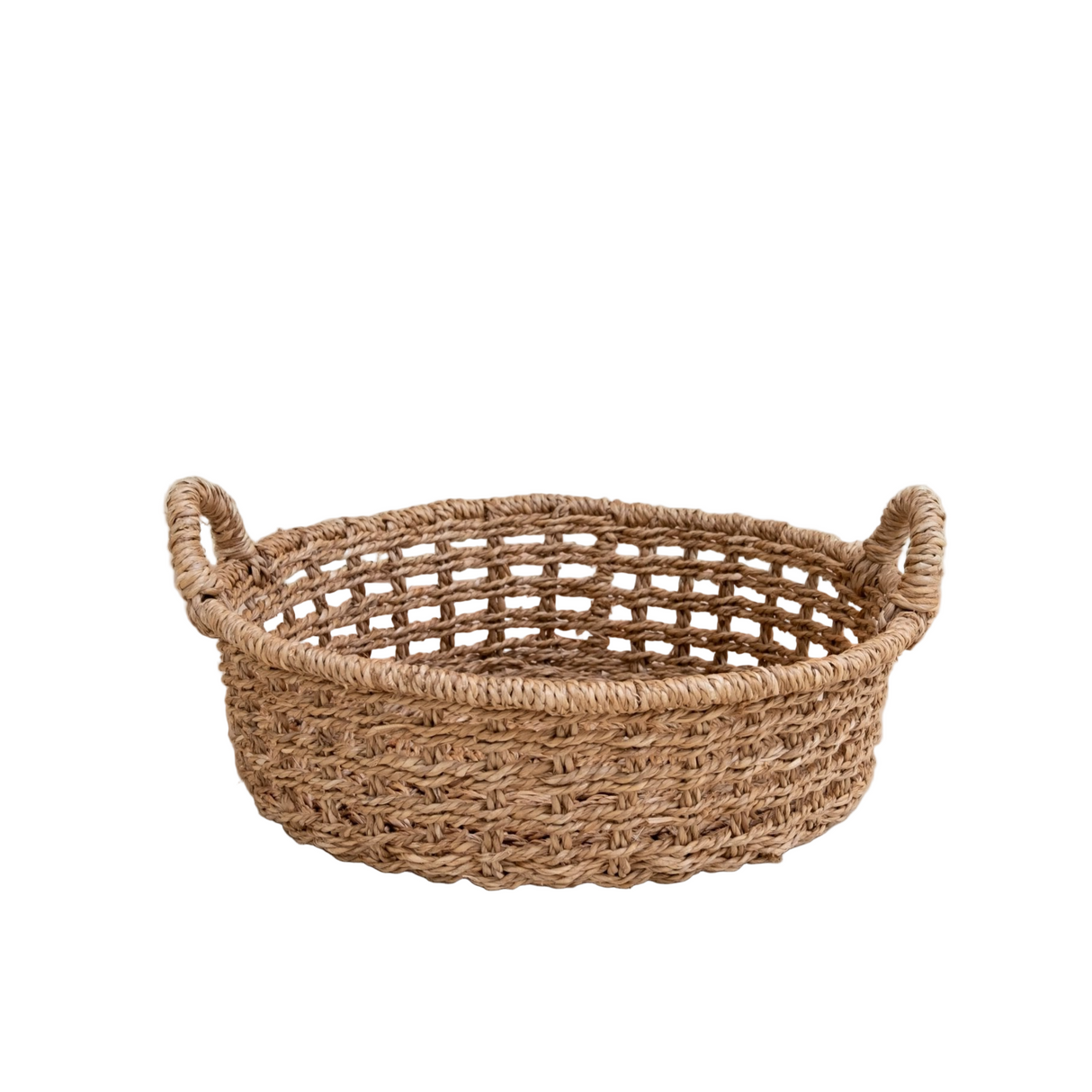 Woven basket with handles on a white background