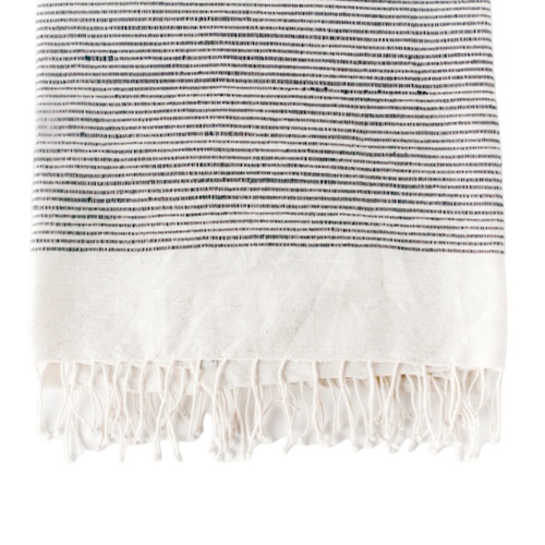 Striped towel with fringes on a white background