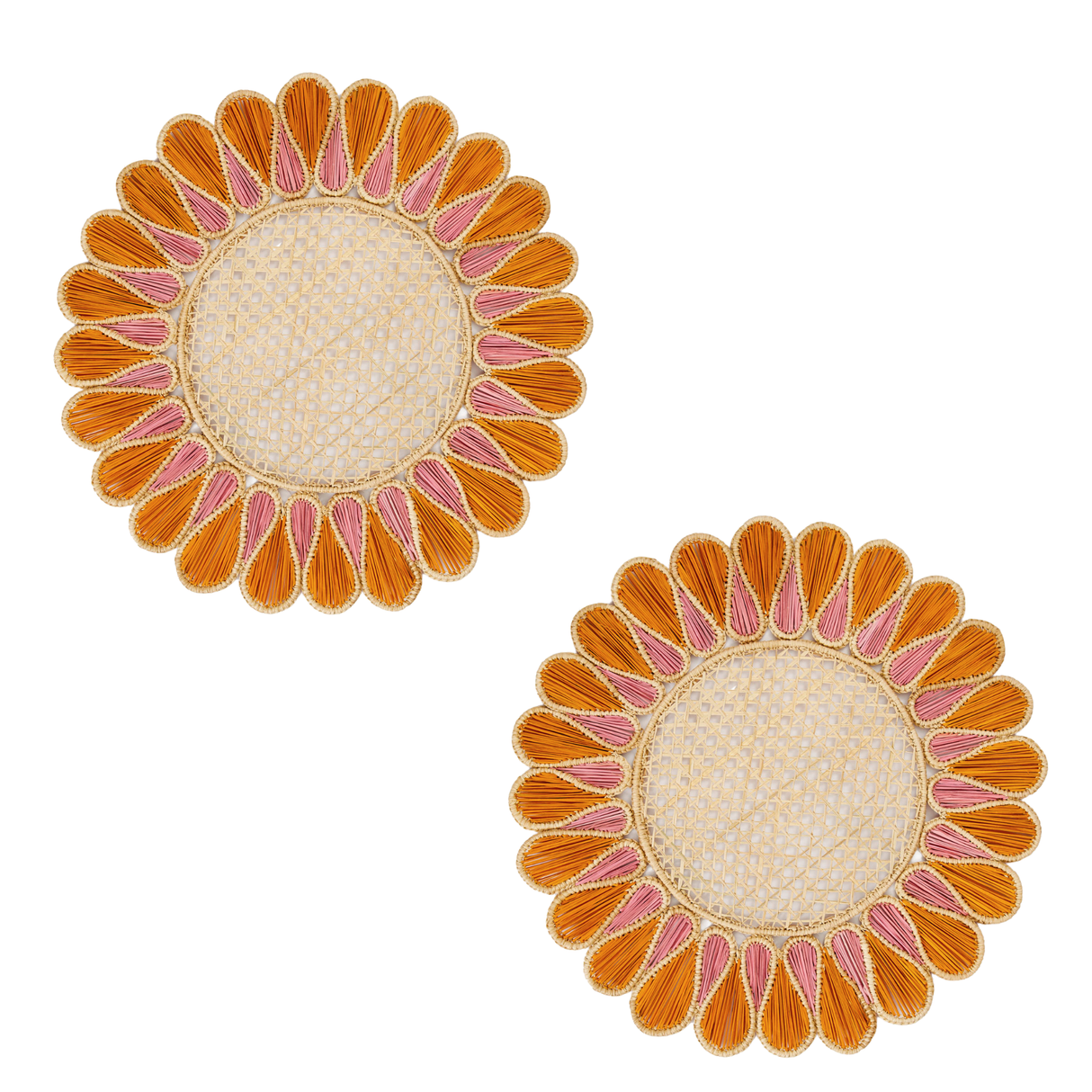 Two sunflower-shaped placemats with orange and pink petals on a white background