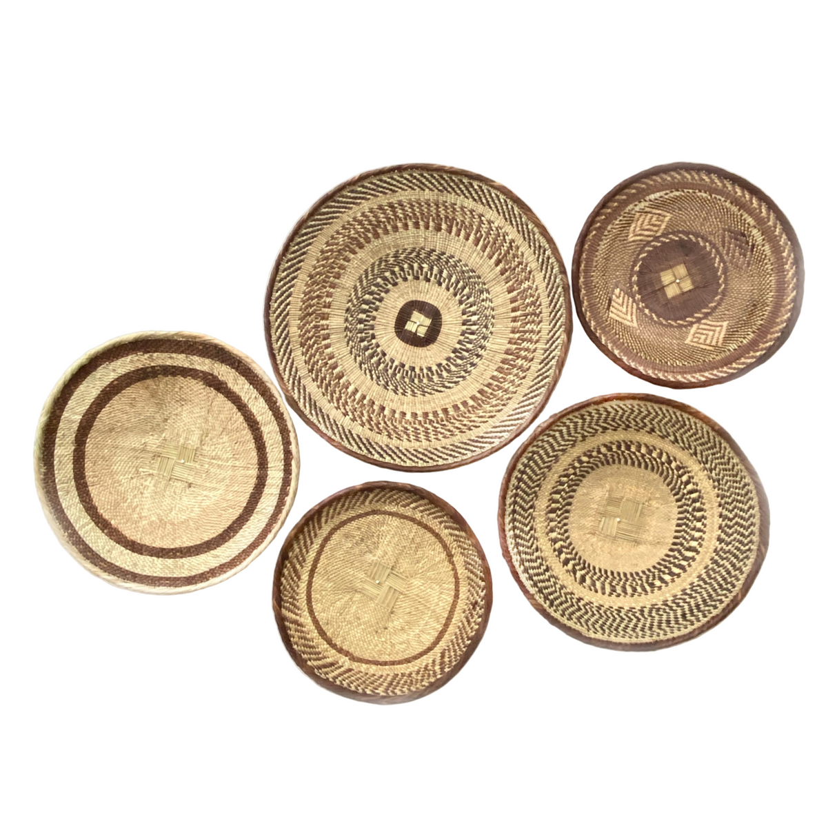 Set of five woven baskets with different patterns on a white background