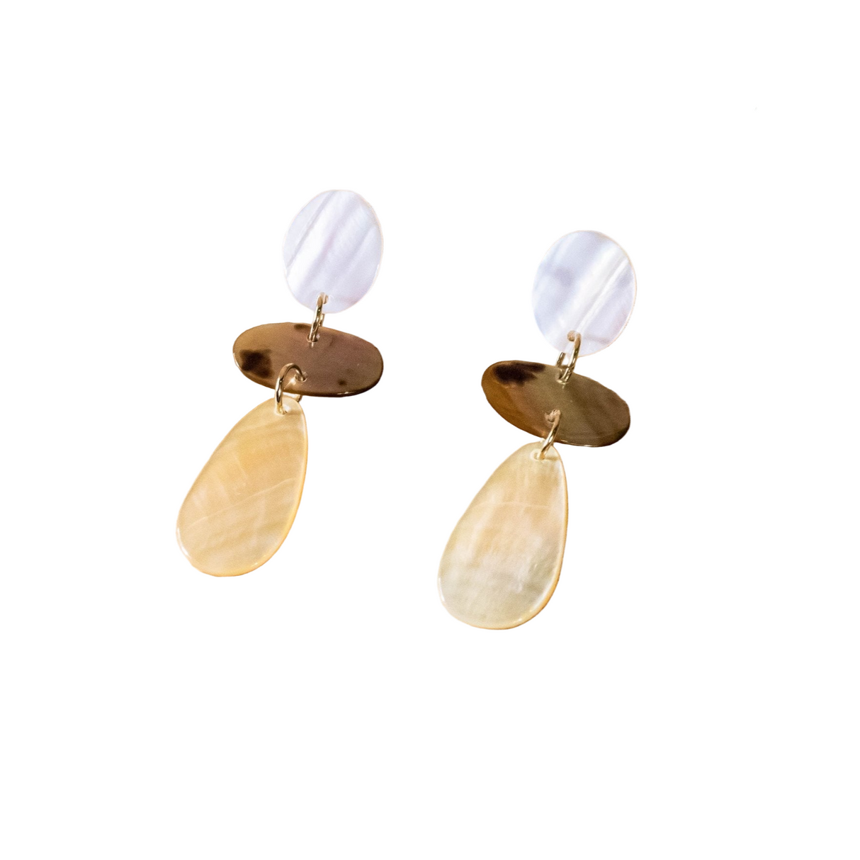 Pair of earrings with gold and beige teardrop shapes on a white background