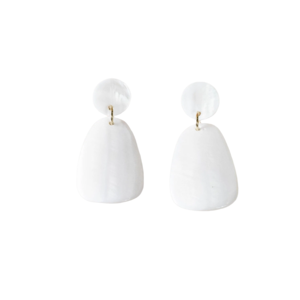 White earrings on a gray background