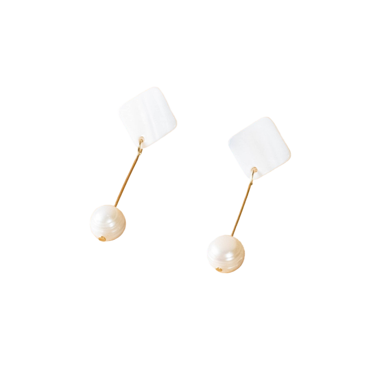Pair of pearl earrings on a white background