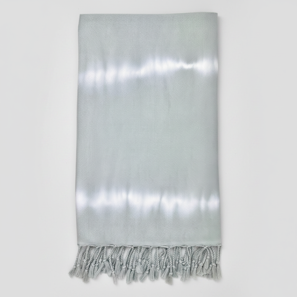 Silver scarf with fringes on a white background