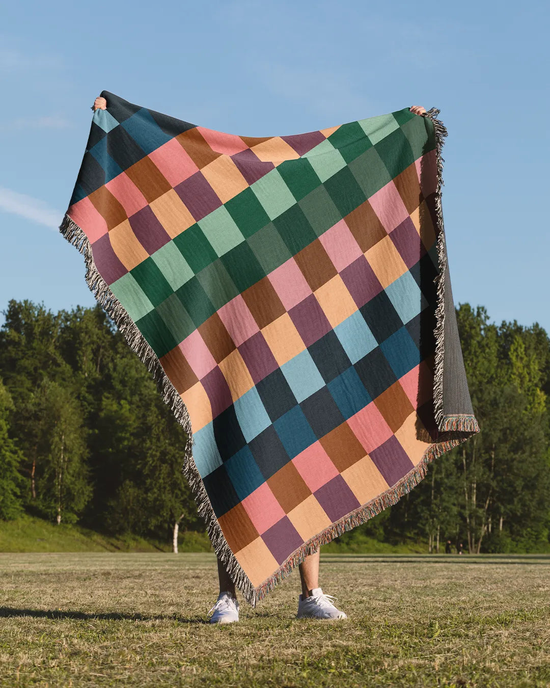 Vibrant Gingham Cotton Woven Throw Blanket with a colorful checker pattern.